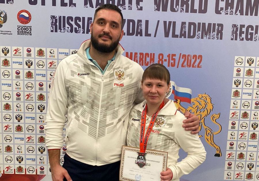 Чемпионка мира Кристина Найдёнова с тренером Андреем Пшеницыным