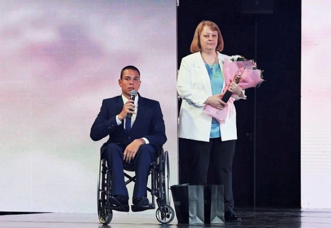 Роман Жданов с тренером Еленой Соколовой. Фото: Паралимпийский комитет России