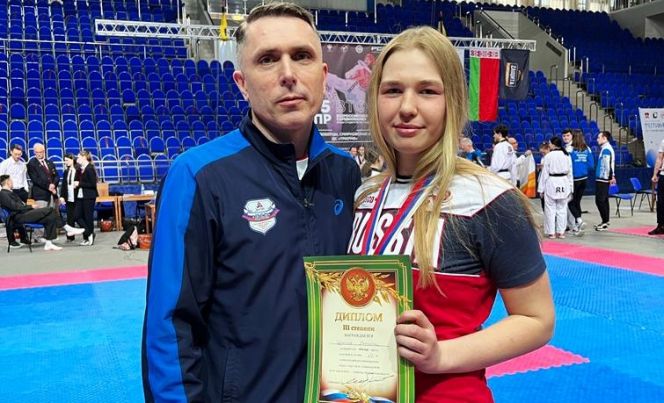 Екатерина Щукина с тренером Петром Маркиным