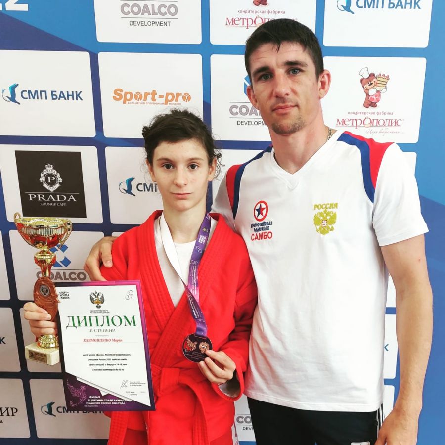 Мария Климошенко и её тренер Виктор Гроо 