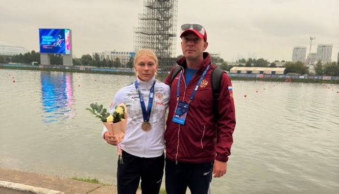 Александра Власова с тренером Михаилом Волковым