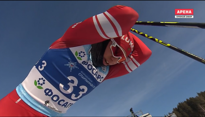 Никита Денисов на финише гонки на 10 км свободным стилем