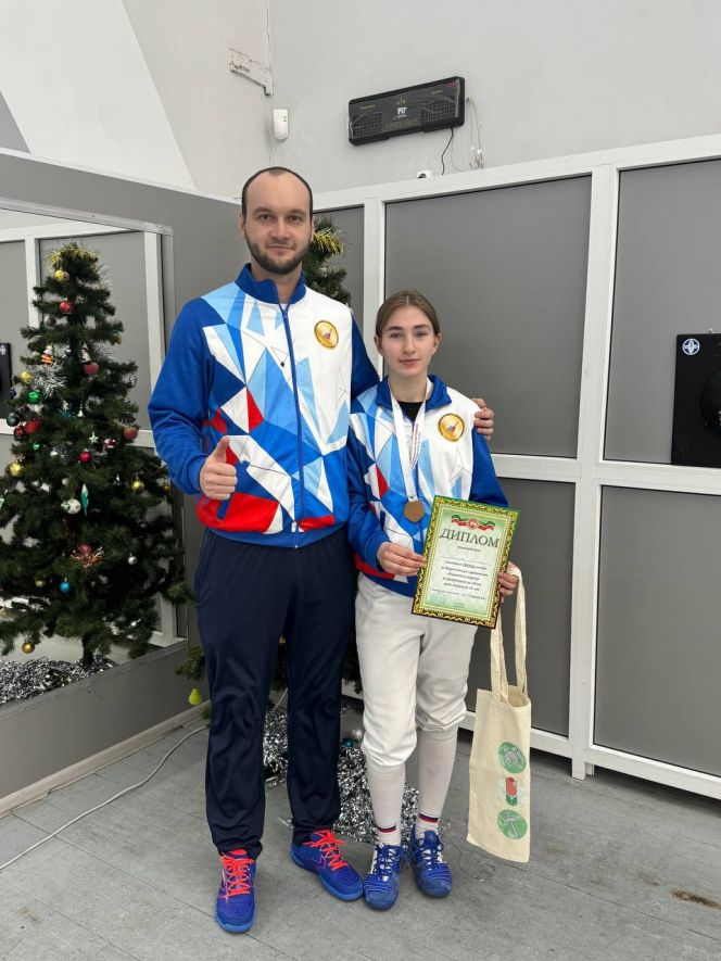 Татьяна Токарева с тренером Данилом Бубенчиковым. Фото: Краевая СШОР