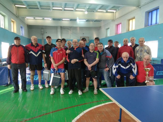 Кубок, ракетки, тёща