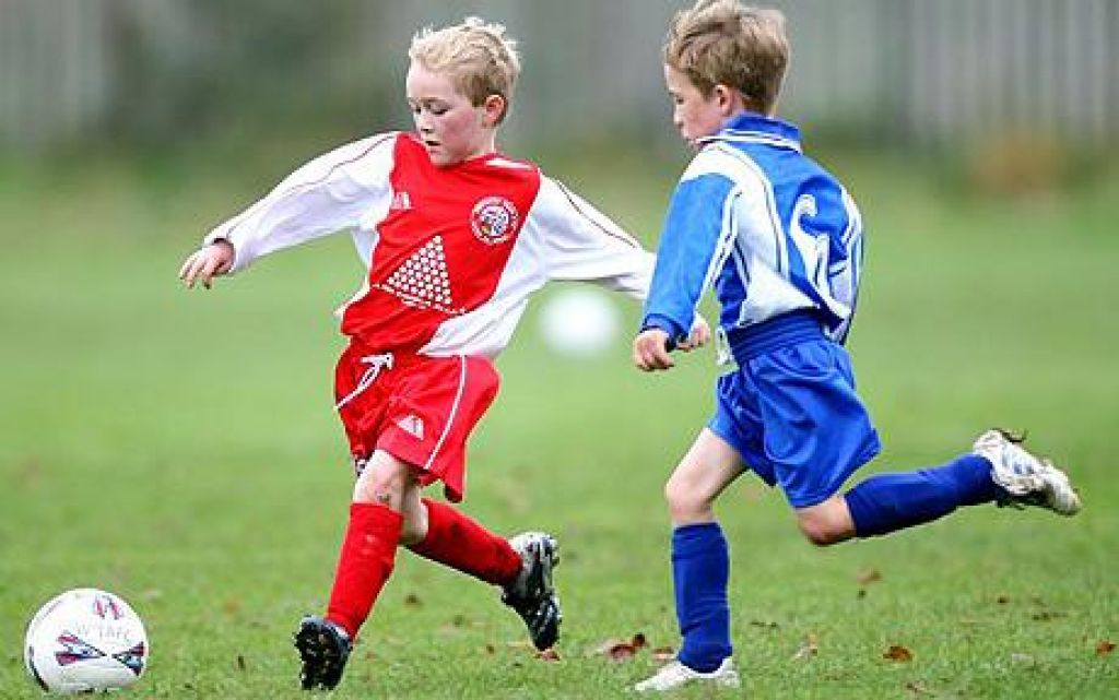 I play football tomorrow. Мальчик футболист блондин. Play Football. Boy is playing Football. Kids Football Players.