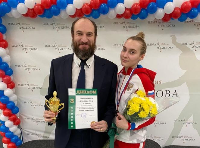 Анна Смирнова и тренер спортсменки Валериан Феоктистов